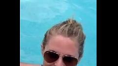 Blowjob in public pool by blonde recorded on mobile phone